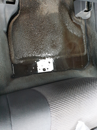 image showing wet car carpet